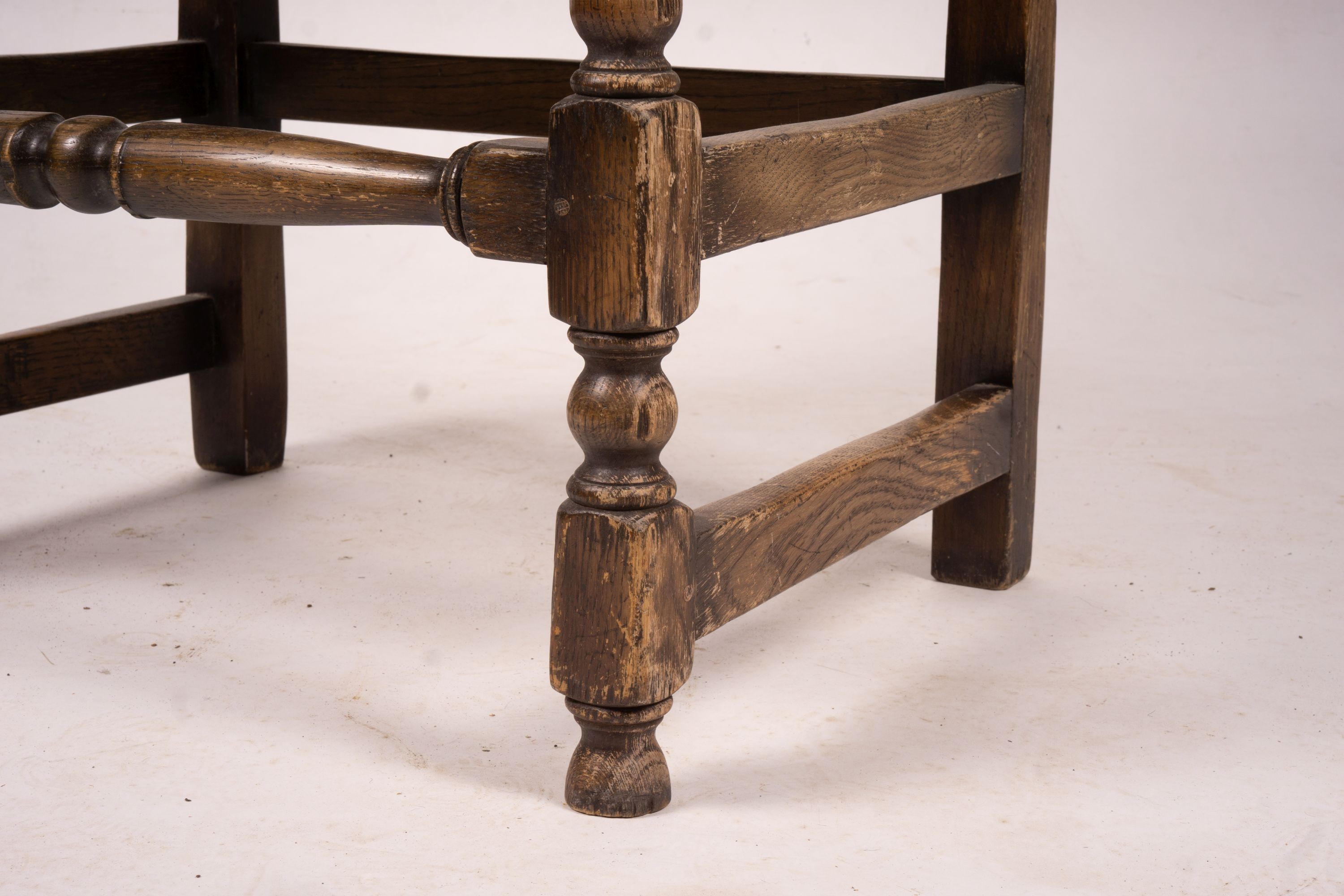 An early 20th century carved oak wainscot chair